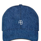 The Jeremy Baseball Cap by Anine Bing features blue denim cotton-twill and a white "AB" monogram embroidered front and center, adding a signature sporty touch to any casual outfit.