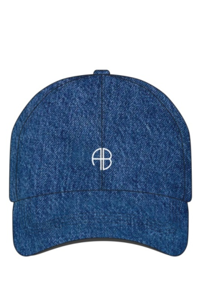 The Jeremy Baseball Cap by Anine Bing features blue denim cotton-twill and a white "AB" monogram embroidered front and center, adding a signature sporty touch to any casual outfit.