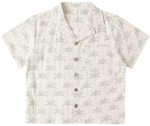 The Rylee & Cru Boys' Lapel Collar Shirt features short sleeves, a button-up front, and a light beige background with a subtle palm tree pattern.
