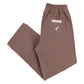 Folded pair of Baby Boys' and Boys' Twill Sheffield Pants by The Beaufort Bonnet Company in Gray Bay Brown, with elastic waistband, back pocket featuring a small white bird logo, and a rectangular label.