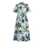 The Erdem Etched Tulip Short Sleeve Shirt Dress is crafted in light blue cotton poplin, featuring a button-down front and an etched tulip print with birds and botanical motifs in green, blue, and black.