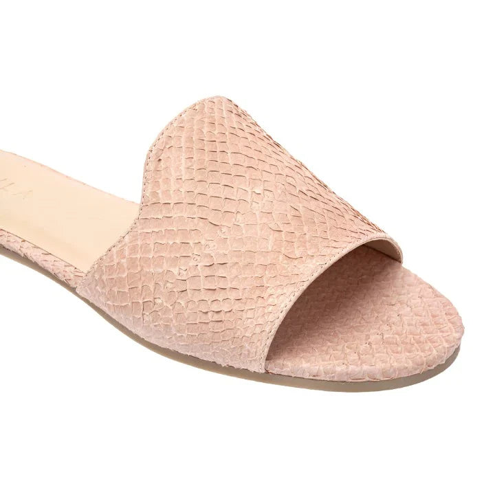 A close-up view of a single Nayla Josefina Sandal by Nayla, featuring a light pink slip-on design with a textured, fish scale-like pattern and an open toe.