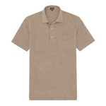 The Sid Mashburn Short-Sleeved Polo, made from beige Peruvian pima cotton, features a cut-and-sew collar, three-button placket, and chest pocket, shown laid flat on a white background.