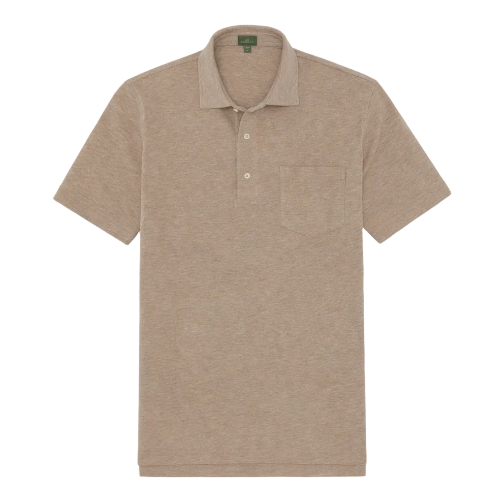 The Sid Mashburn Short-Sleeved Polo, made from beige Peruvian pima cotton, features a cut-and-sew collar, three-button placket, and chest pocket, shown laid flat on a white background.