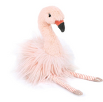 Florine Flamingo by Mon Ami features a fluffy pink body, long striped legs, black beak, and shiny feet. This adorable plush flamingo sits upright against a white background, making it the perfect cuddly companion for any stuffed animal collection.