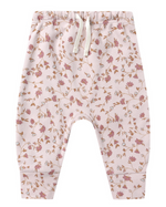 The Quincy Mae Baby Drawstring Pant is crafted from organic brushed jersey in light pink, featuring an elastic waistband and an all-over floral print in shades of pink and brown.