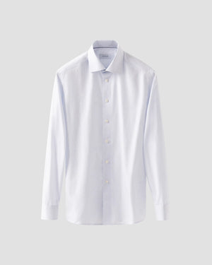 Displayed on a plain light gray background, the Contemporary Geometric Print Poplin Shirt by Eton features long sleeves, a collar, and a classic button-up design, offering a modern twist on a timeless wardrobe staple.