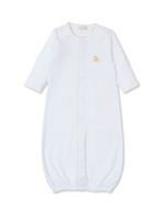 The Kissy Kissy Baby Premier Duckling Convertible Gown features soft white Pima cotton, a front snap closure, and a small yellow duck embroidered on the left chest.