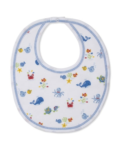The Kissy Kissy Ocean Antics Printed Bib is crafted from the softest cotton for ultimate comfort. This white baby bib features blue trim and colorful sea animal illustrations, including whales, crabs, octopuses, turtles, and starfish.
