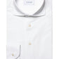 A white Eton Four-Way Stretch Shirt displayed flat, featuring a pointed collar and buttoned cuffs.