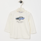A white Bonpoint Tahsin T-shirt for baby boys and boys, made from organic cotton, features a playful dog print.
