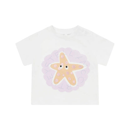 The Stella McCartney Kids Baby Girls' Starfish T-Shirt features a smiling starfish graphic with purple accents and dotted text—perfect as a cute summer or beach shirt.