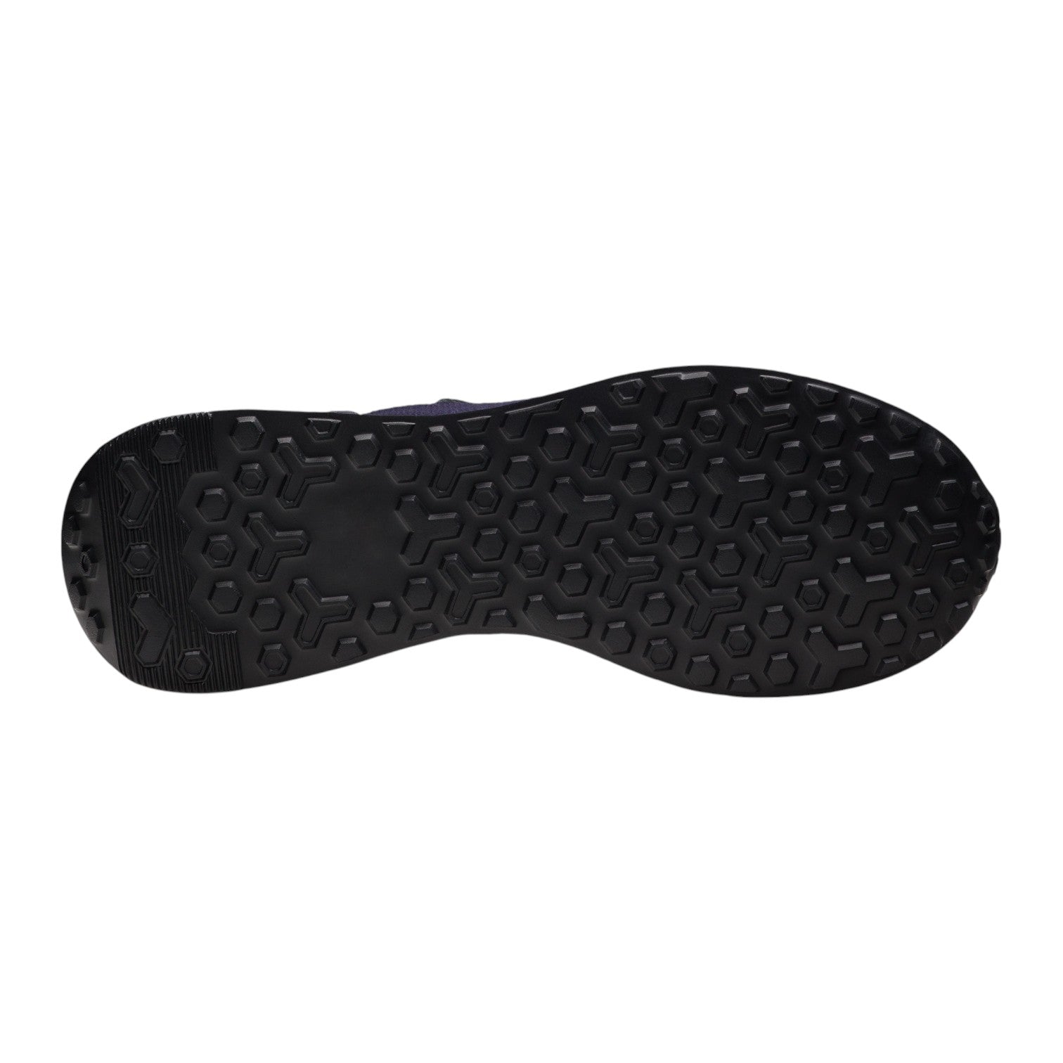 The image displays the black rubber outsole of the Magnanni Stratus Sneaker, which has a hexagonal tread pattern for traction and a modern sport sole.