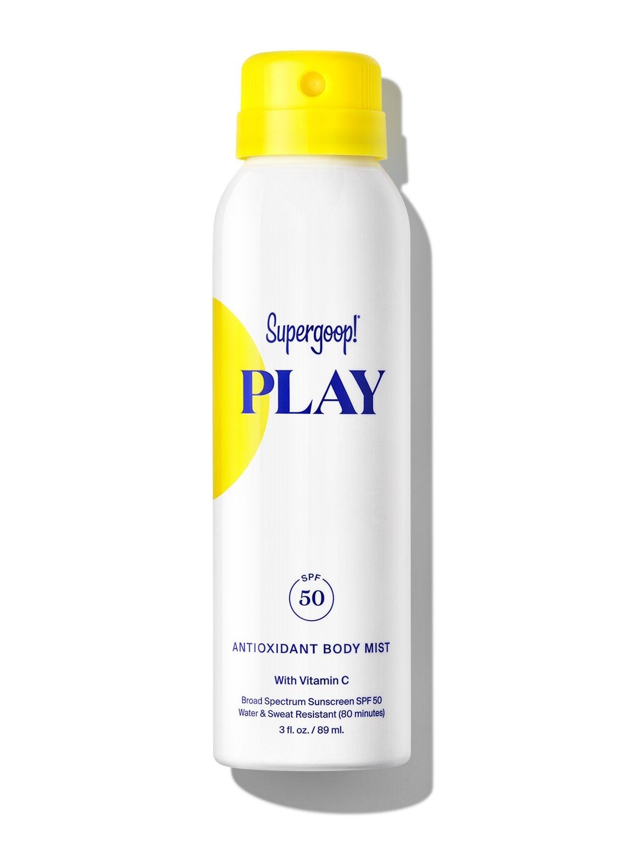 A 3 oz aerosol can of Supergoop Play Antioxidant Mist with Vitamin C SPF 50 water-resistant sunscreen body spray featuring a yellow cap and blue text.