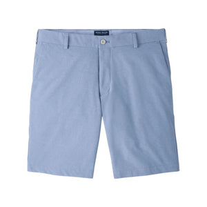 A pair of light blue Peter Millar Surge Performance Shorts featuring four-way stretch apparel, isolated on a white background.