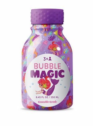 A purple 8.45 fl oz (250 ml) Bubble Magic bottle by Crocodile Creek, featuring wands, a mermaid and sea creatures design; perfect for bubbles and outdoor play. For ages 3+.