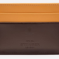 The Ettinger Bridle Flat Credit Card Case features two-tone yellow and dark brown bridle hide leather, the embossed Ettinger logo on the lower front, and multiple card pockets for easy organization.