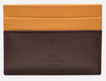 The Ettinger Bridle Flat Credit Card Case features two-tone yellow and dark brown bridle hide leather, the embossed Ettinger logo on the lower front, and multiple card pockets for easy organization.