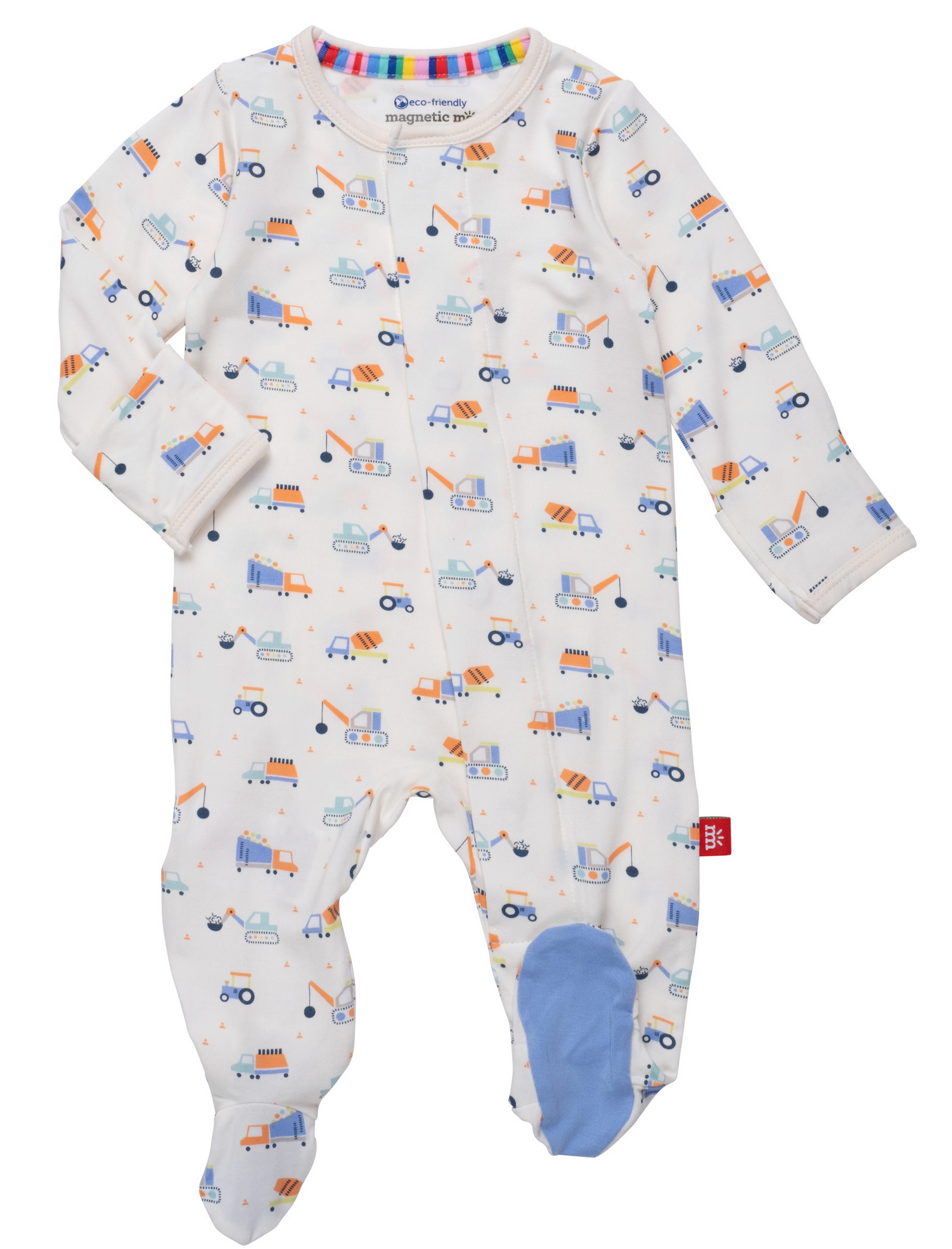 The Magnetic Me Baby Boys' Footie is a white onesie with colorful construction vehicles, made from eco-friendly TENCEL™ modal, featuring long sleeves and blue fabric on the right foot.
