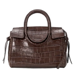 Dark brown Staud Maude Mini Carryall with a croc-embossed leather texture, two top handles, and a detachable shoulder strap.