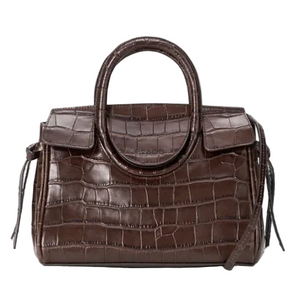 Dark brown Staud Maude Mini Carryall with a croc-embossed leather texture, two top handles, and a detachable shoulder strap.