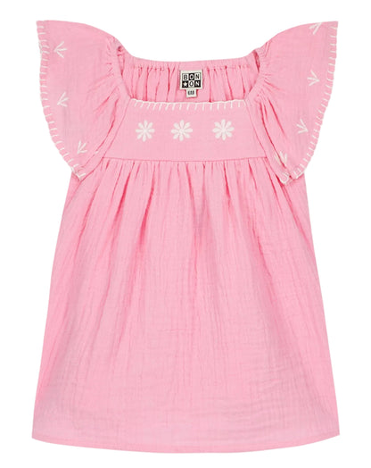 The Baby Girls' Revebb Dress by Bonton is a pink cotton gauze toddler dress with white embroidery and ruffled sleeves, shown flat on a white background.
