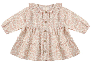 The Quincy Mae Baby Girls’ and Girls’ Ruffle Collar Button Dress, featuring long sleeves, a floral pattern, wooden buttons down the front, a ruffle collar, and a gathered waist, is displayed flat against a white background.