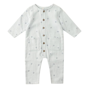 The Quincy Mae Baby Boys' Pocketed Woven Jumpsuit features long sleeves, front buttons, two front pockets, and a small star print on light cotton gauze fabric.