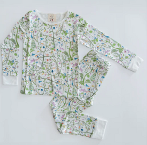 Timo & Violet Kids' The Two Piece Pajamas feature a vibrant floral and vine print on white. Made from organic cotton, this set includes a long-sleeve top and pants—perfect for cozy, comfortable sleep.