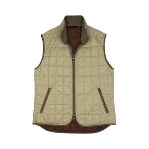 The Theo Nylon Vest by Waterville, shown in beige with quilted detailing, a front zipper, and two angled zippered pockets, is displayed flat on a white background—making it a stylish layering piece to wear over a shirt or under a blazer.