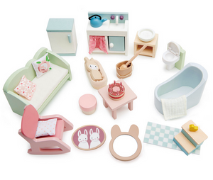 The Countryside Furniture Set by Tender Leaf Toys features a charming collection of pastel-colored, miniature furniture, perfect for a countryside or wooden dolls house. The set includes a sofa, bed, bathtub, toilet, kitchen unit, fridge, table with cake, rocking chair, and adorable bunny-themed accessories—all beautifully displayed on a white background.