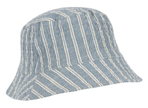 The Kids’ Elliot Bucket Hat by Konges Slojd features blue organic cotton fabric with white diagonal and vertical stripes, offering a textured finish ideal for enhancing your child’s summer wardrobe. Shown here against a plain background.