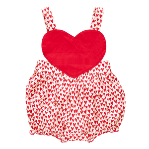 The Pink Chicken Baby Girls' Lucy Love Bubble romper features mini hearts, an oversized heart-shaped bodice, adjustable shoulder straps, and a gathered waist.