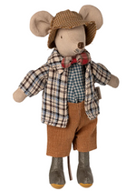 Granddad Mouse by Maileg is a charming stuffed mouse dressed in a plaid jacket, green checked shirt, brown corduroy shorts, bow tie, brown hat, and gray boots. This delightful companion also includes magnets in his paws for added playtime fun.