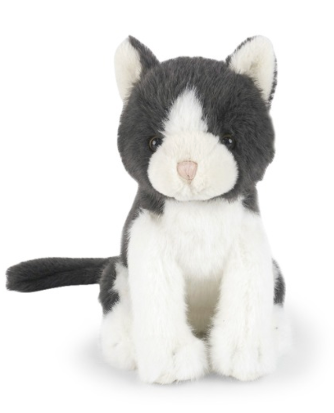 The Felix Cat plush by Mon Ami features soft, curly fur and sits upright facing forward, wrapped in a fluffy black jacket with its plush tail curved to the side—making it the perfect snuggling companion for cozy moments.