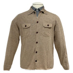 The Alan Paine Tore Cardigan with Pockets in beige, styled over a blue and white checkered collared shirt, offers a versatile layering option and is displayed on a mannequin.
