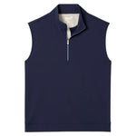 The Johnnie-O Torque Vest is a sleeveless navy quarter-zip with a stand-up collar, made from dri-comfort nylon for superior moisture wicking. Shown laid flat on white, it’s a versatile layering piece for any season.