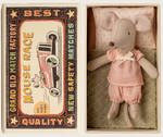 The Maileg Little Sister Mouse, dressed in pink clothes, rests in a charming matchbox bed beside a vintage-style "Grand Old Match Factory" box labeled "Best Quality Mouse Race New Safety Matches.