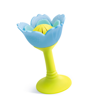 The Hape Rattle & Teether Blue is a silicone flower-shaped citrus juicer with chewy petals and a yellow stem, perfect for sensory play in the kitchen.