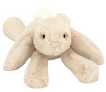 The Jellycat Smudge Rabbit Medium is a soft beige plush toy with floppy ears and a white tail, perfect as a baby gift. This charming bunny offers comfort and delight, making it an ideal companion for little ones.