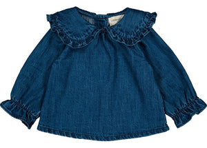 The Louis Louise Baby Girls' Yvette Light Denim Tunic features long sleeves, a ruffled Peter Pan collar, and ruffled cuffs.