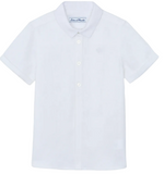 A boys’ linen shirt by Tartine et Chocolat, featuring a plain white color, short sleeves, and a collar, displayed on a flat surface.