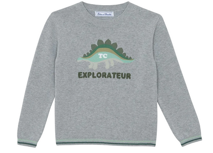 The Boys’ Illustration Sweater by Tartine et Chocolat is a gray, 100% cotton kids’ long-sleeve sweater featuring a green dinosaur graphic with the initials “TC” on the dinosaur and the word “EXPLORATEUR” underneath.