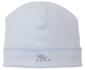 The Kissy Kissy Premier Elephant Esprit Hat with Hand Emb. is a light blue Pima cotton baby hat featuring a small hand-embroidered elephant and grass on the front, plus scalloped trim around the brim.
