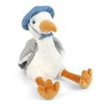 Seymour Seagull by Mon Ami is a charming plush toy featuring an orange beak and feet, gray wings, and a blue hat tied with a bow. Sitting upright on a white background, this whimsical seagull makes the perfect addition to any coastal decor.
