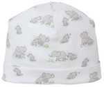 The Kissy Kissy Elephant Esprit Printed Hat is a soft Pima cotton baby hat with playful cartoon elephants and blue grass tufts—perfect for adding adorable style to your baby's wardrobe.