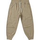 Rylee & Cru Boys’ Century Tech Jogger in beige, showcasing a relaxed fit with an elastic waistband, white drawstring, and side pockets, displayed flat on a white background.