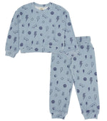 The Feather 4 Arrow Baby Boys’ and Boys’ Icon Hacci Set is a blue children’s pajama set featuring long sleeves and pants, crafted from soft hacci fabric. Decorated with dark blue smiley faces, lightning bolts, ice cream cones, and animal faces, this cozy top and bottom set is perfect for kids’ loungewear.