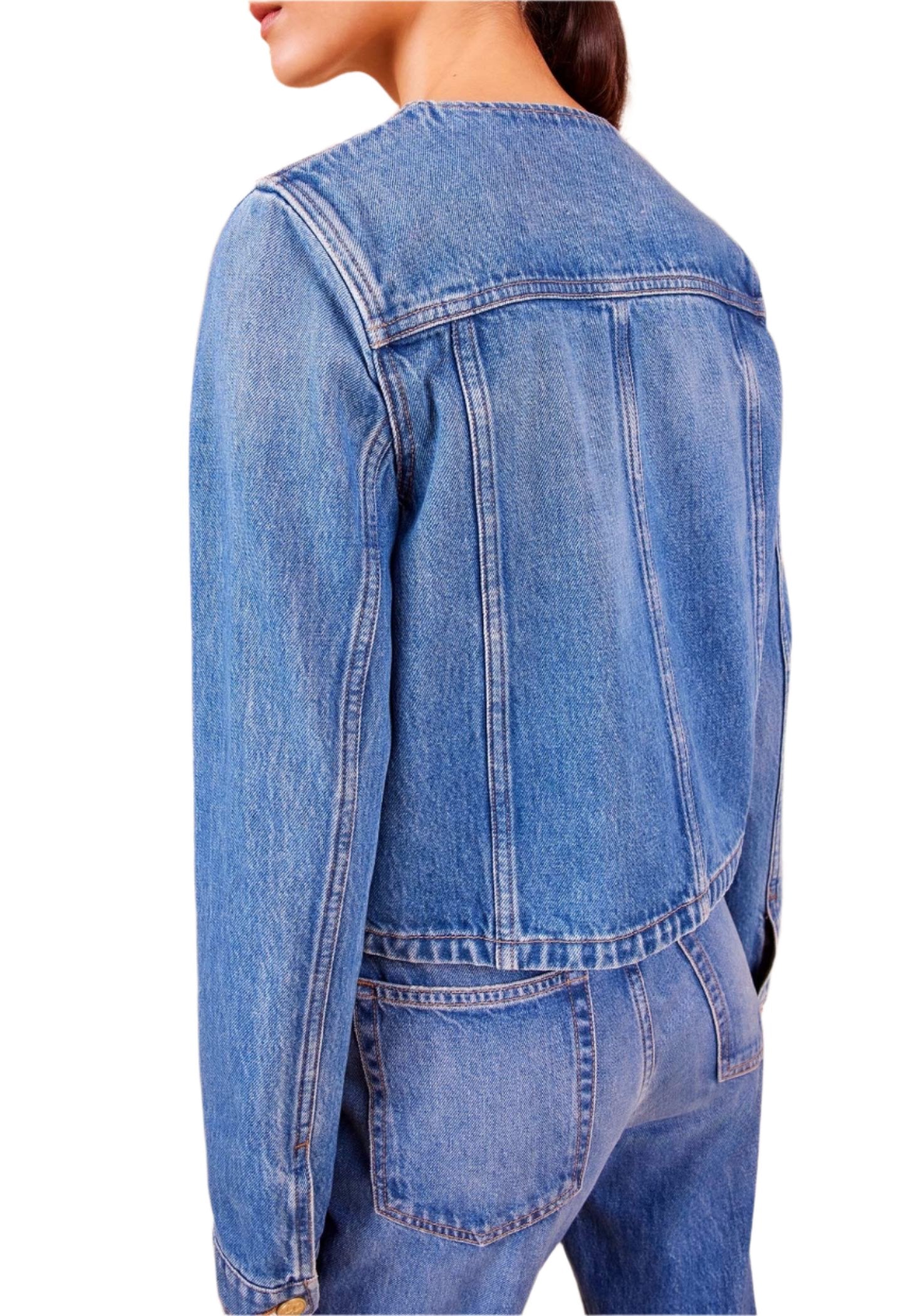 A person is shown from the back wearing the Ulla Johnson Sabine Jacket and jeans, both featuring a vintage-inspired wash.