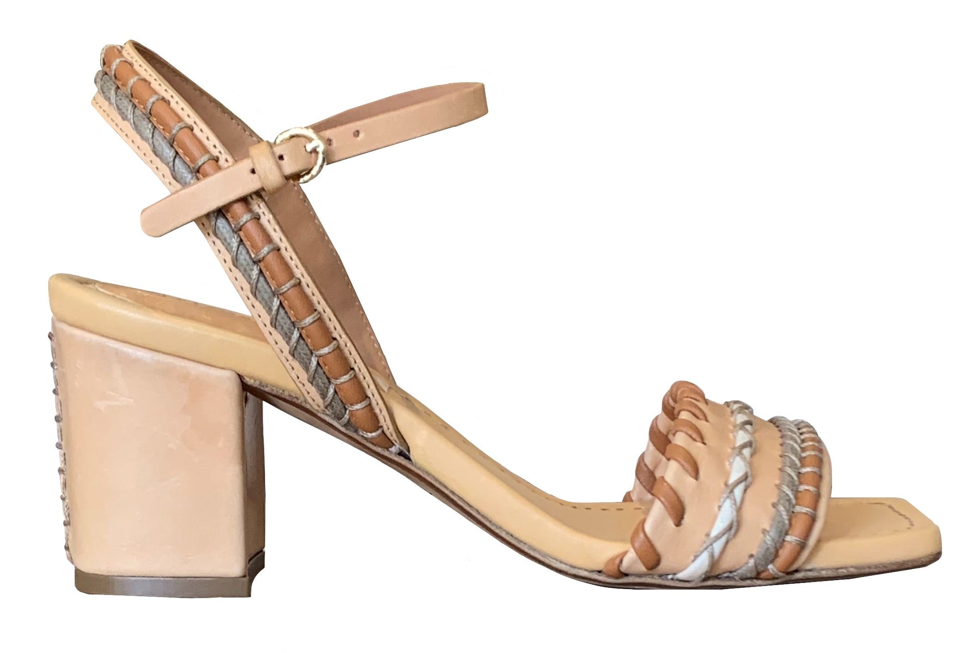 The Ulla Johnson Sofia Sandal is a beige, block-heeled sandal by Ulla Johnson, featuring an elegant ankle strap. Made from vegetable-tanned leather, it boasts intricate braided detailing on the front strap and sides for a touch of sophistication.